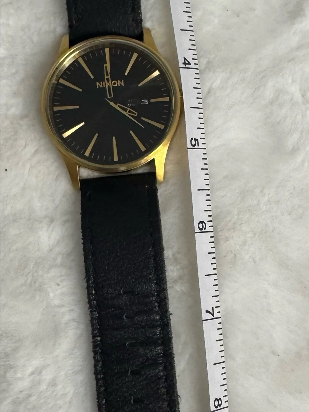 Nixon men’s gold